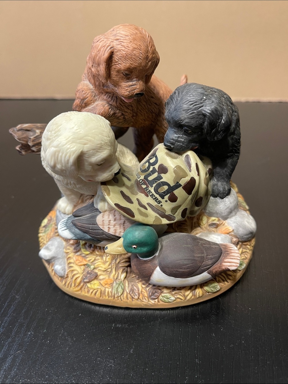 Three Puppy Figurine with Duck Decoy - Brown, Black, Cream